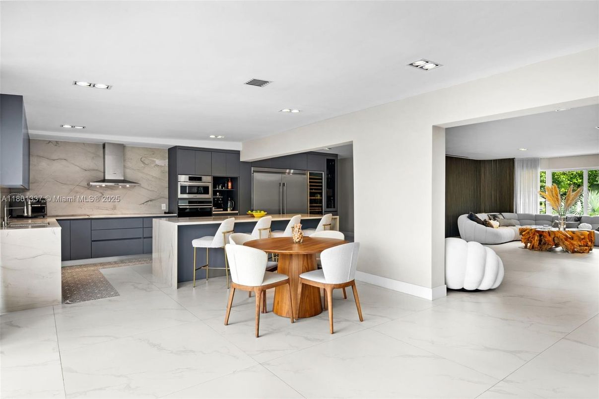 Dining room, Interior, Kitchen, Living room, Marble, Marble Walls, Recessed Lighting, Stainless Steel Appliances