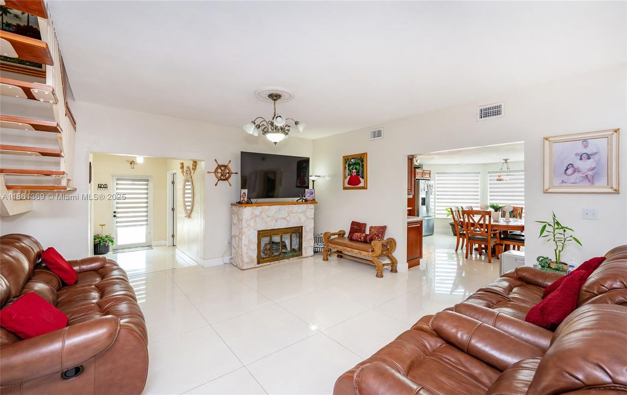 Chandelier, Dining room, Fireplace, Interior, Living room