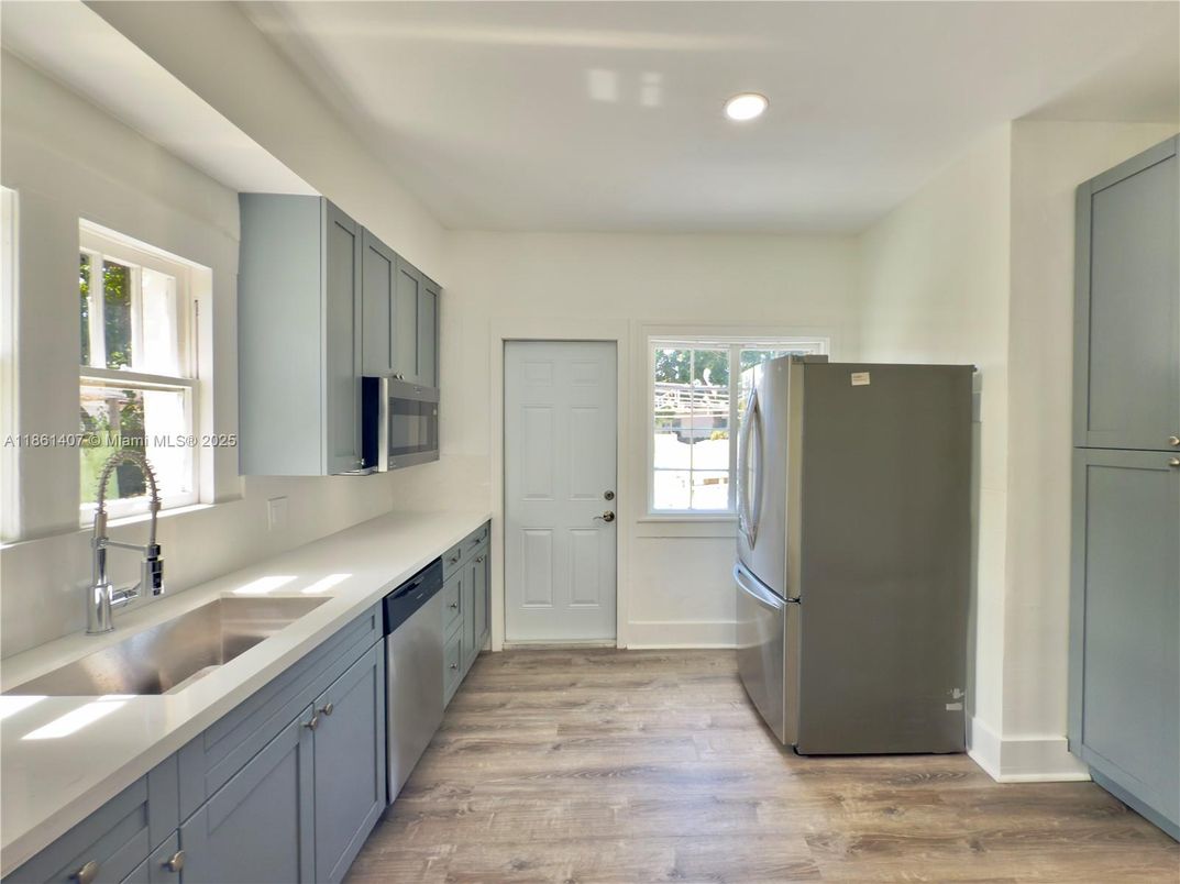 Interior, Kitchen, Recessed Lighting, Stainless Steel Appliances, Wood Texture Flooring