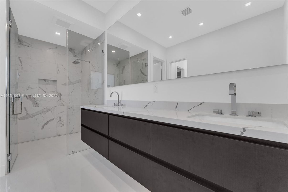 Bathroom, Dual Sink Vanities, Glass Shower, Interior, Marble Walls, Recessed Lighting