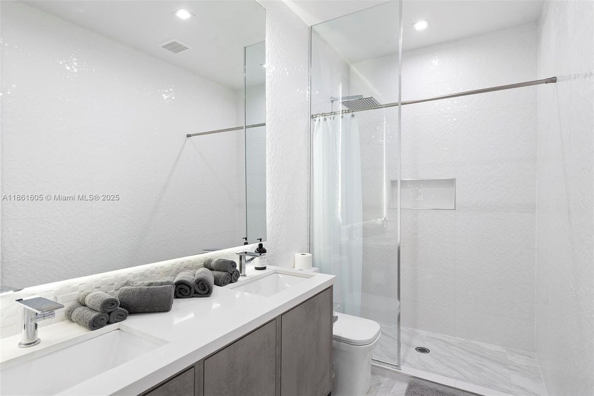 Bathroom, Dual Sink Vanities, Glass Shower, Interior, Marble, Recessed Lighting