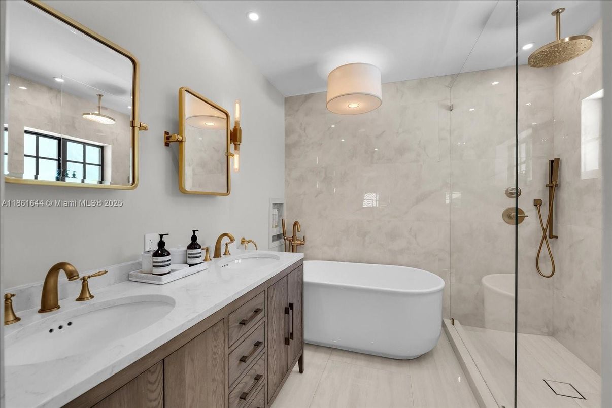 Bathroom, Dual Sink Vanities, Free Standing Baths, Glass Shower, Interior, Marble Walls, Recessed Lighting