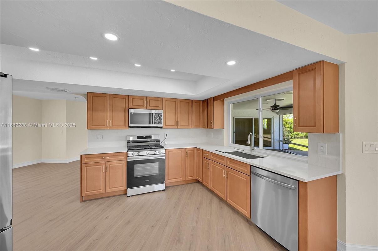 Interior, Kitchen, Recessed Lighting, Stainless Steel Appliances, Wood Texture Flooring