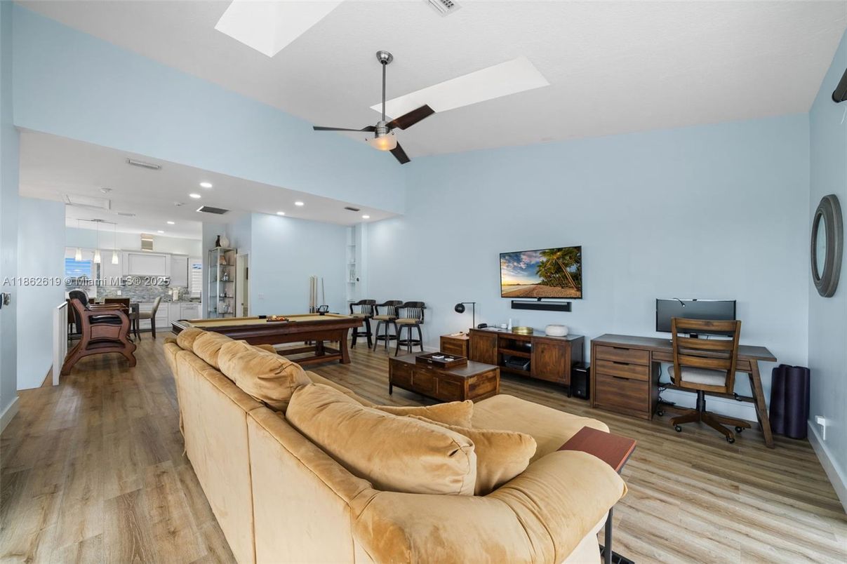 Billiard Table, Game Room, Home Office, Interior, Living room, Pendant Lights, Recessed Lighting, Wood Texture Flooring