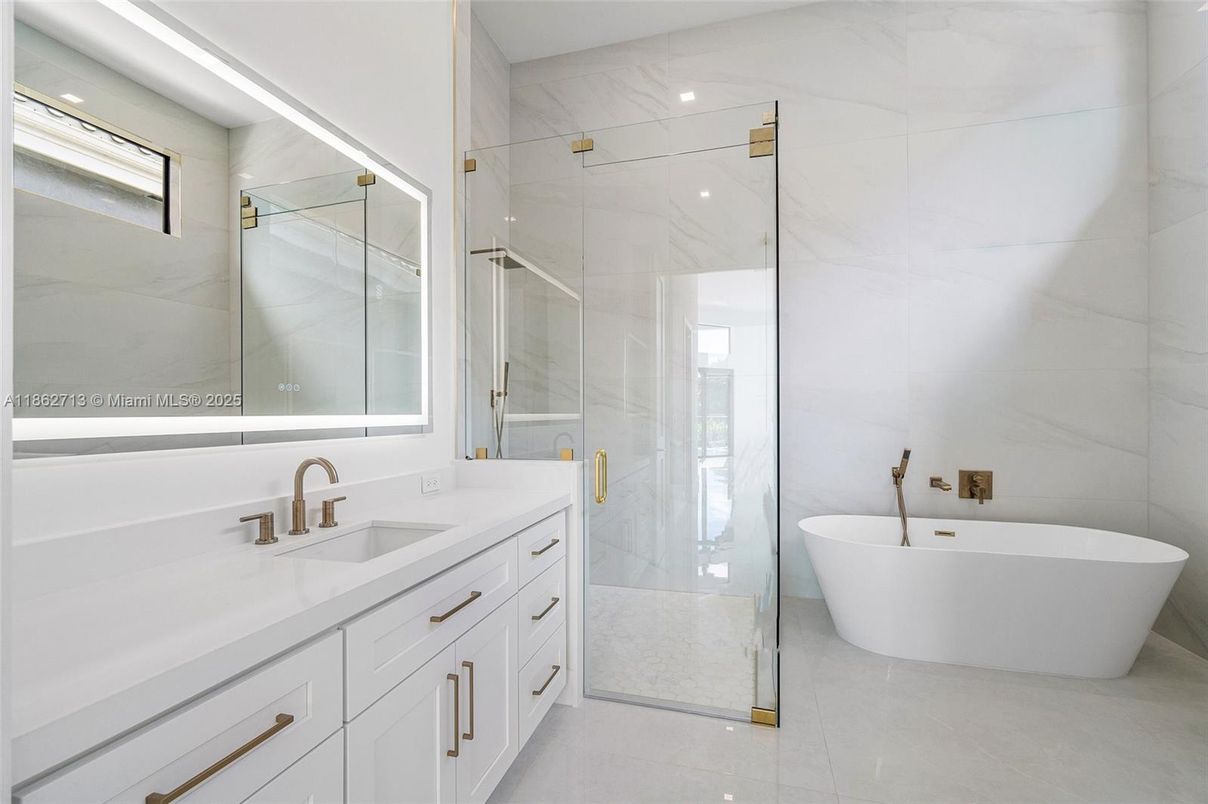 Bathroom, Dual Sink Vanities, Free Standing Baths, Glass Shower, Interior, Marble Walls, Recessed Lighting