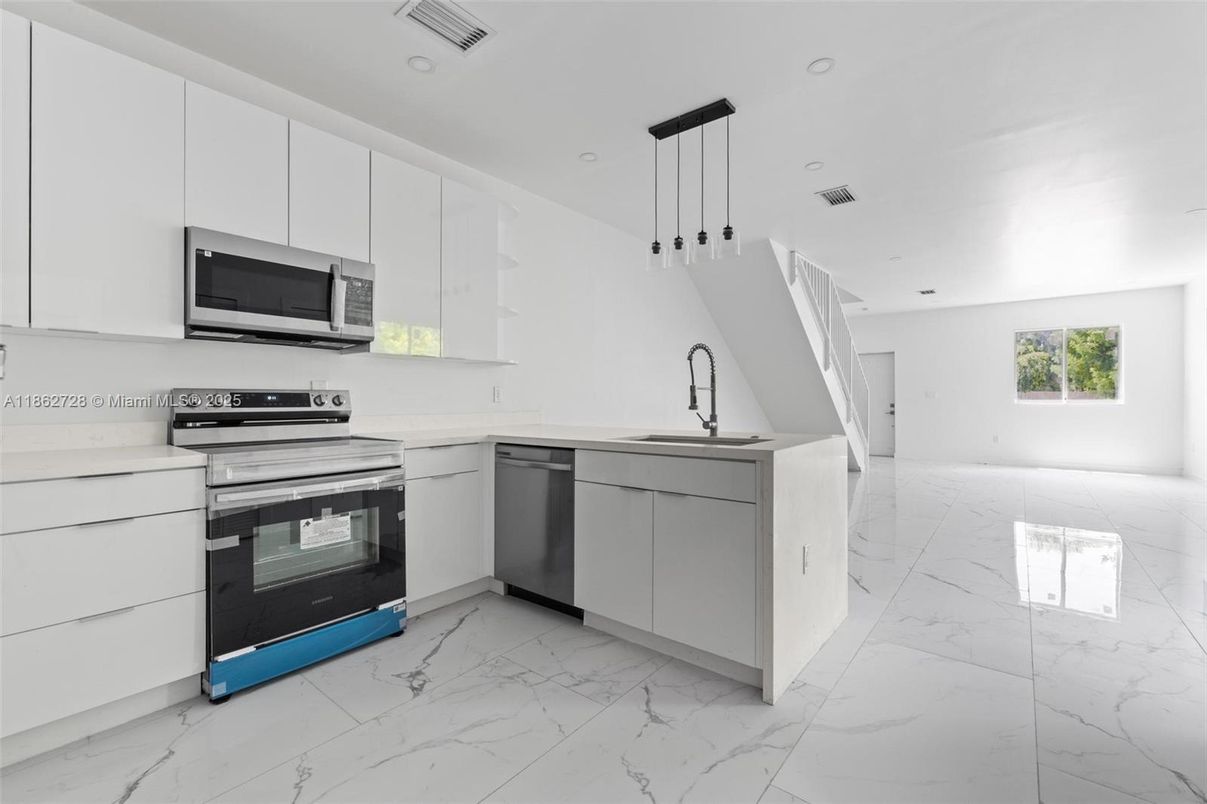 Interior, Kitchen, Marble, Pendant Lights, Recessed Lighting, Stainless Steel Appliances