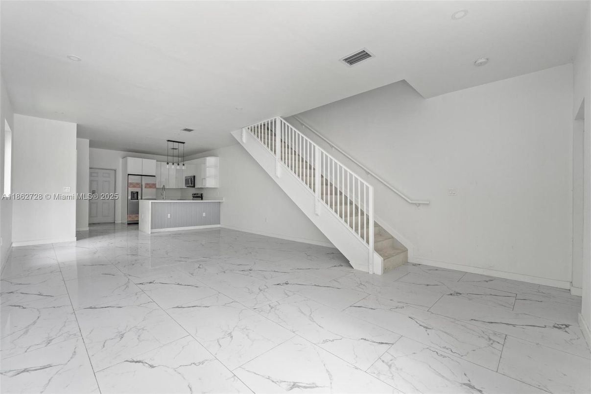 Empty room, Interior, Kitchen, Marble, Pendant Lights, Recessed Lighting, Stainless Steel Appliances