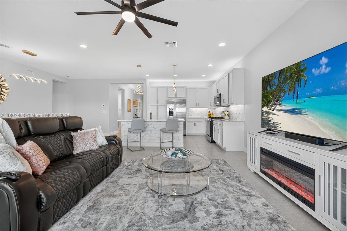 Fireplace, Interior, Kitchen, Living room, Pendant Lights, Recessed Lighting, Stainless Steel Appliances