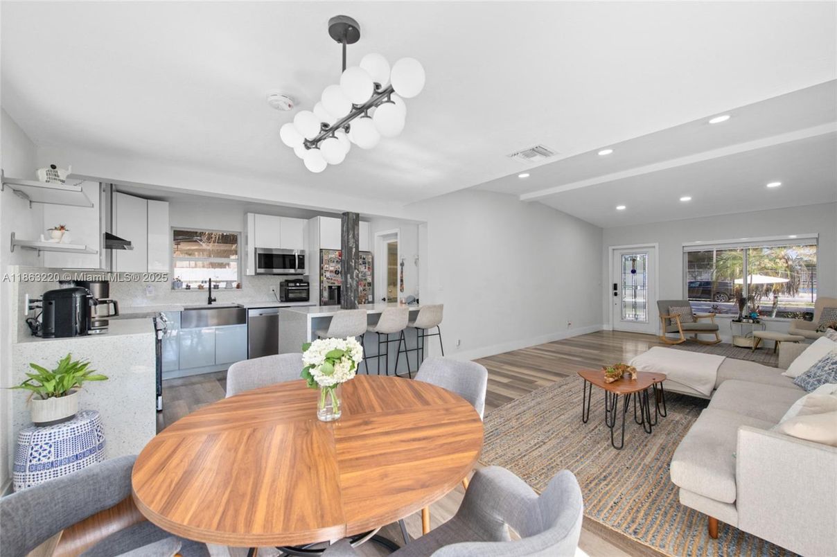 Dining room, Interior, Kitchen, Living room, Recessed Lighting, Stainless Steel Appliances, Wood Texture Flooring