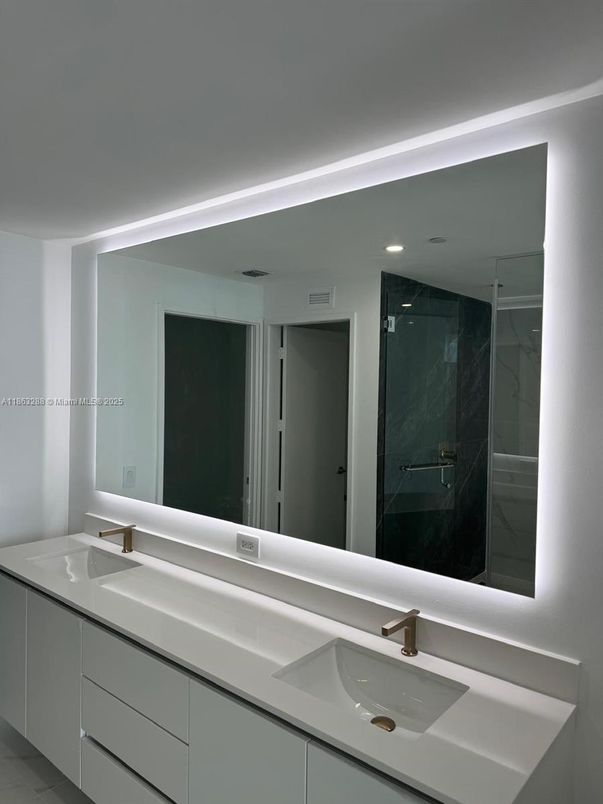 Bathroom, Dual Sink Vanities, Glass Shower, Interior, Marble Walls, Recessed Lighting