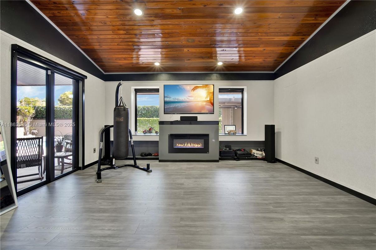 Fireplace, Fitness Equipment, Interior, Recessed Lighting, Wooden Ceilings, Wood Texture Flooring