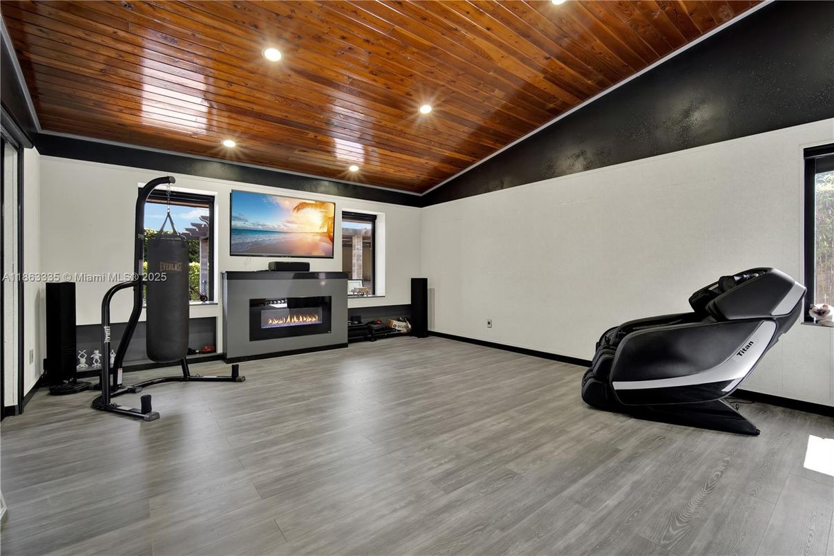 Fireplace, Fitness Equipment, Interior, Recessed Lighting, Wooden Ceilings, Wood Texture Flooring
