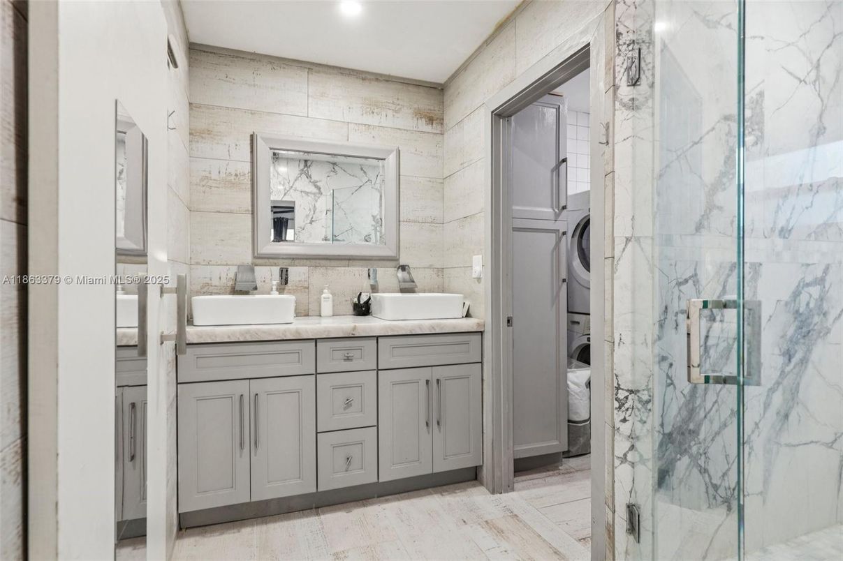 Bathroom, Dual Sink Vanities, Glass Shower, Interior, Marble Walls, Recessed Lighting