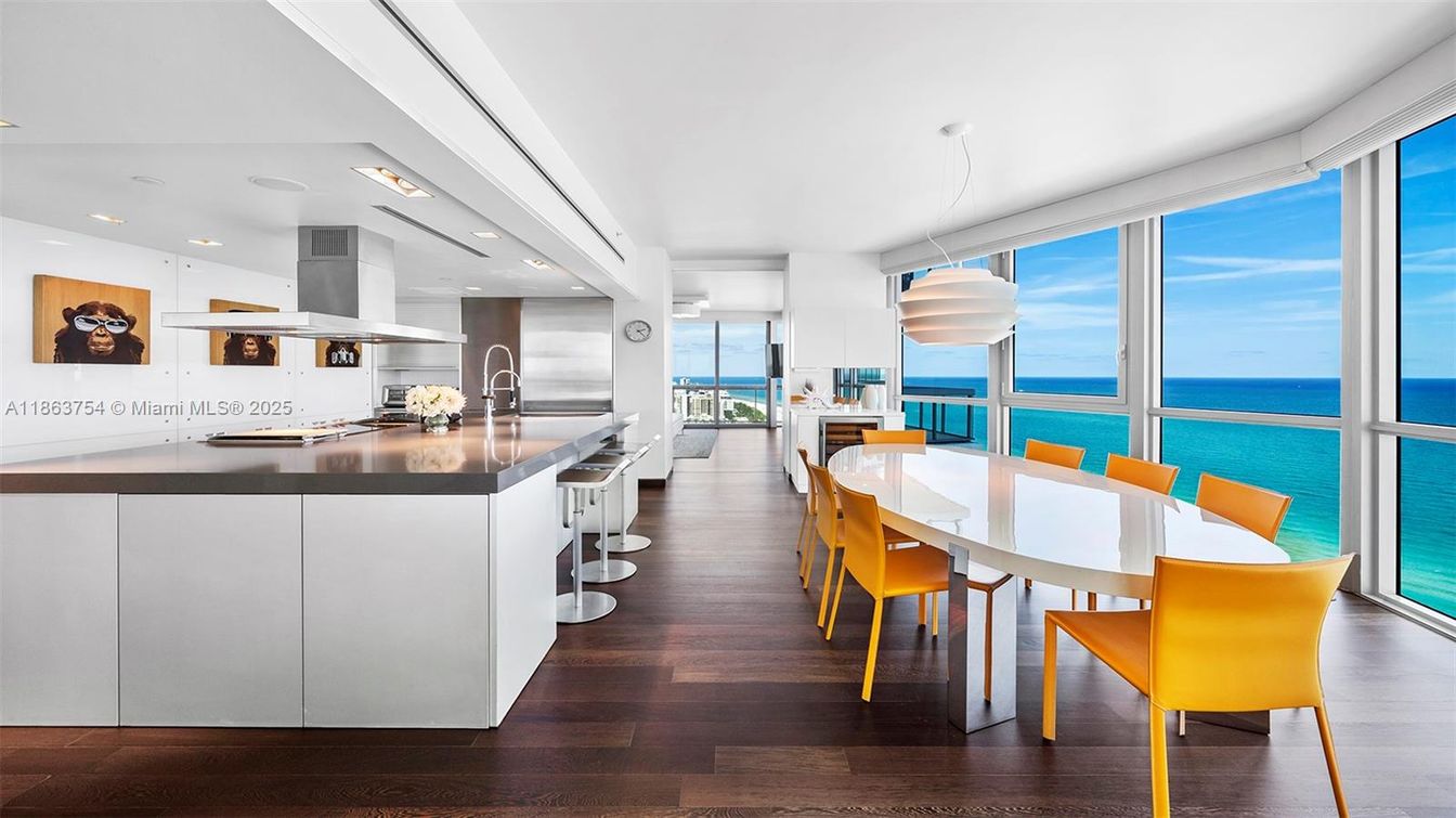 Dining room, Interior, Kitchen, Pendant Lights, Recessed Lighting, Stainless Steel Appliances, Water, Wood Texture Flooring