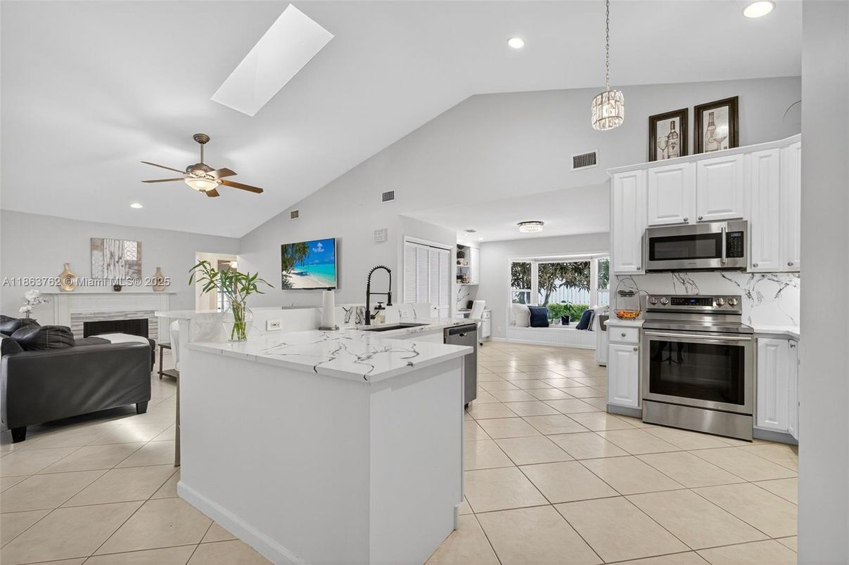 Fireplace, Interior, Kitchen, Living room, Pendant Lights, Recessed Lighting, Stainless Steel Appliances