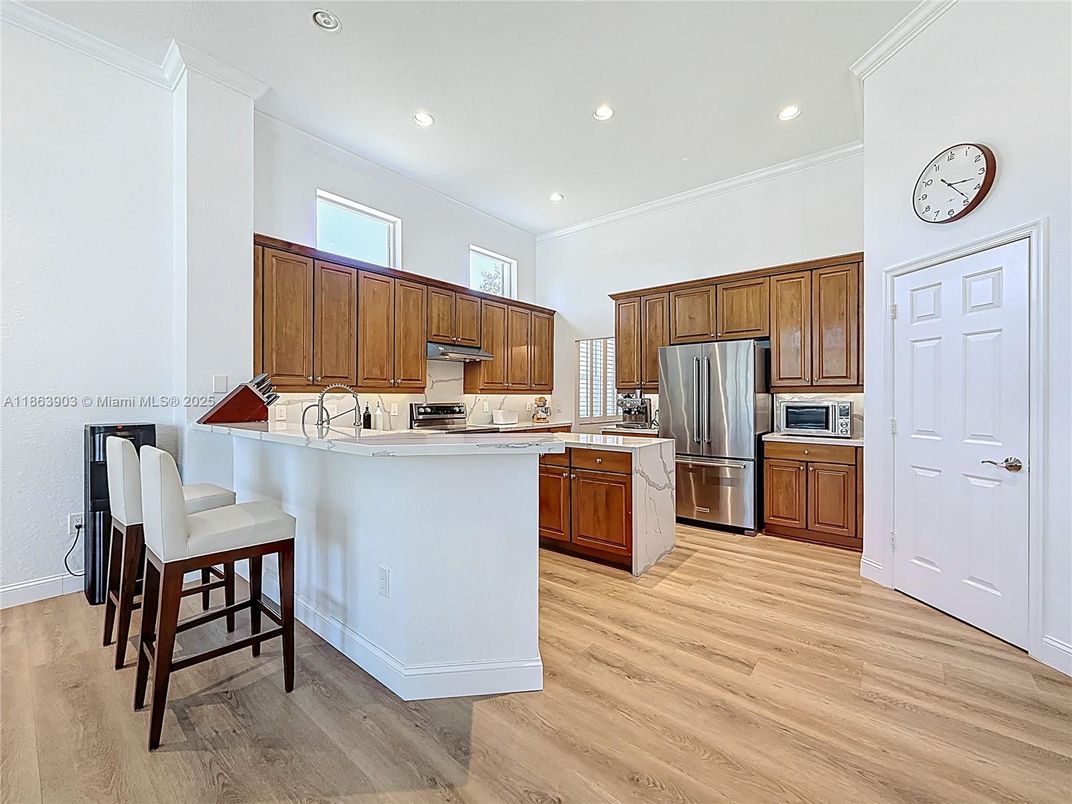 Interior, Kitchen, Recessed Lighting, Stainless Steel Appliances, Wood Texture Flooring