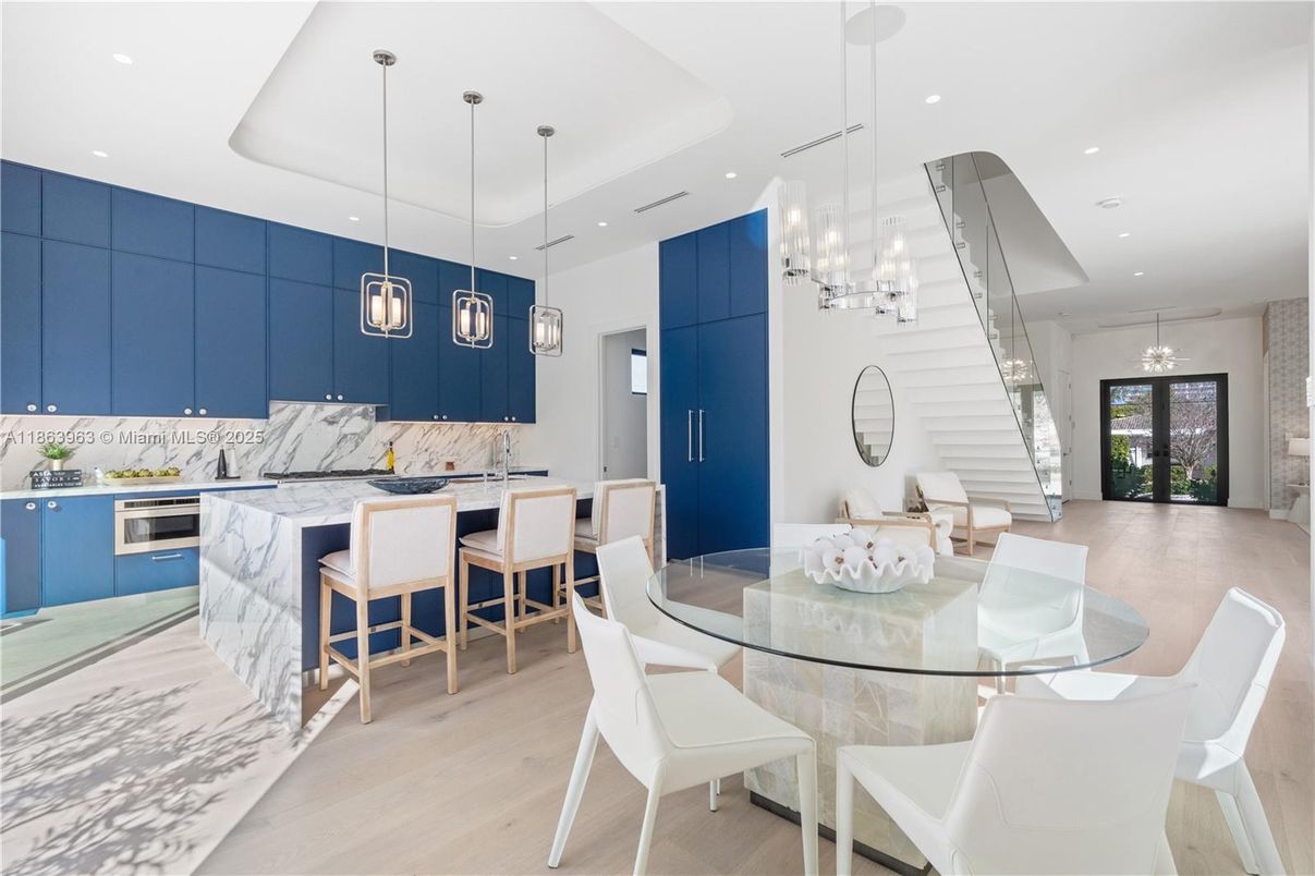 Chandelier, Dining room, Interior, Kitchen, Pendant Lights, Recessed Lighting, Stainless Steel Appliances, Wood Texture Flooring