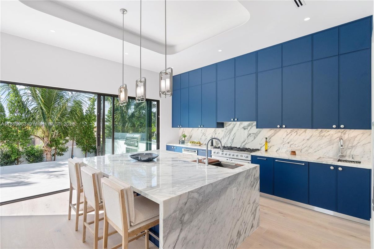 Interior, Kitchen, Marble Walls, Pendant Lights, Recessed Lighting, Stainless Steel Appliances, Wood Texture Flooring