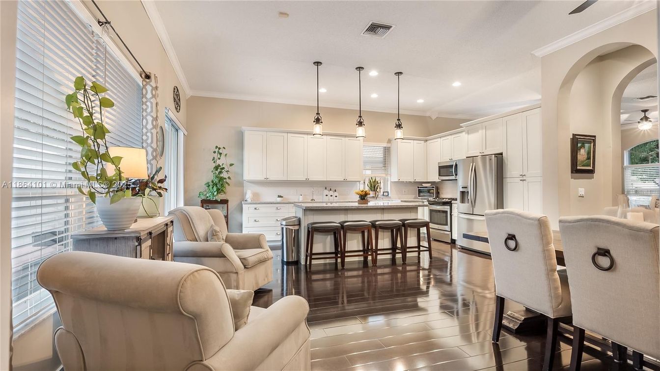 Dining room, Interior, Kitchen, Pendant Lights, Recessed Lighting, Stainless Steel Appliances, Wood Texture Flooring