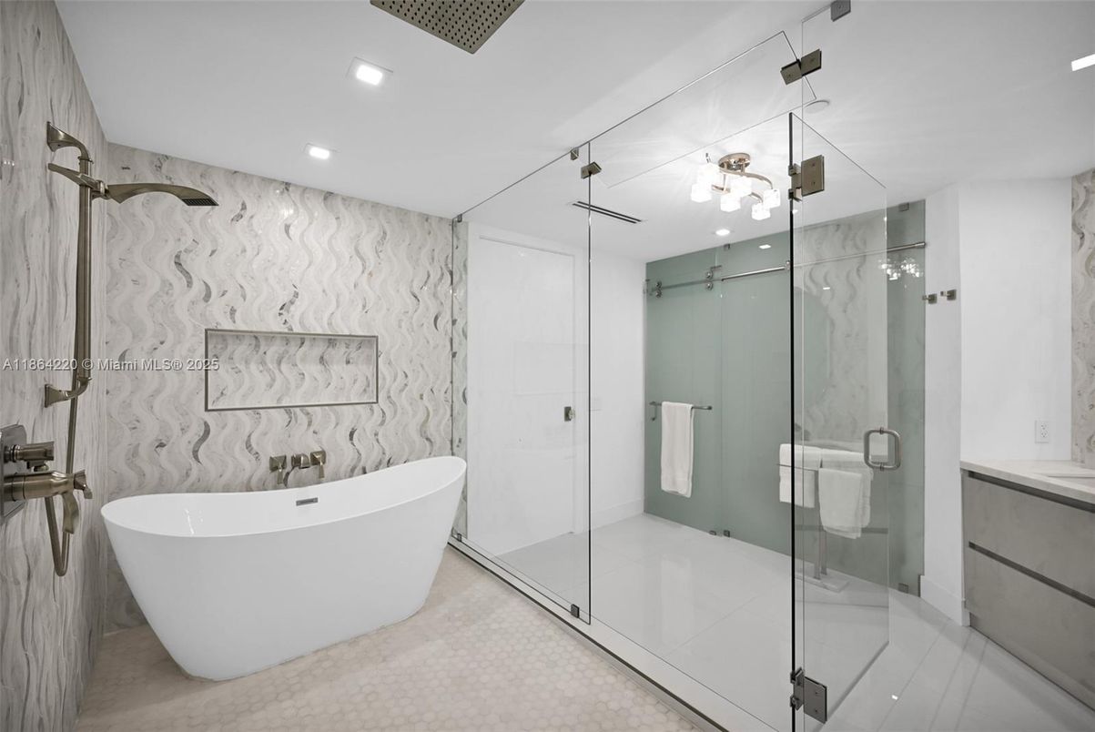 Bathroom, Free Standing Baths, Glass Shower, Interior, Marble Walls, Recessed Lighting