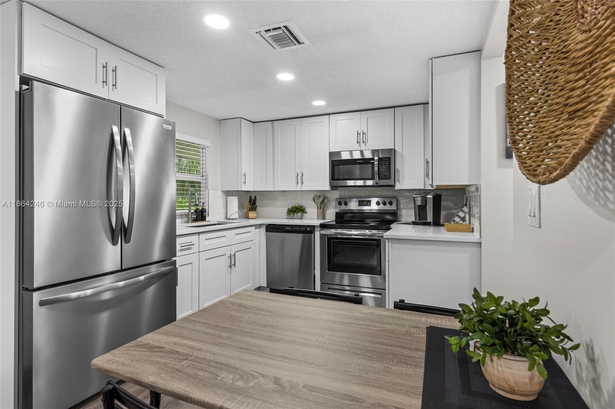 Interior, Kitchen, Recessed Lighting, Stainless Steel Appliances, Wood Texture Flooring