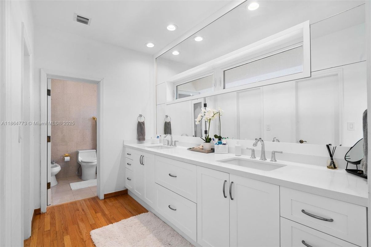 Bathroom, Dual Sink Vanities, Interior, Recessed Lighting, Wood Texture Flooring
