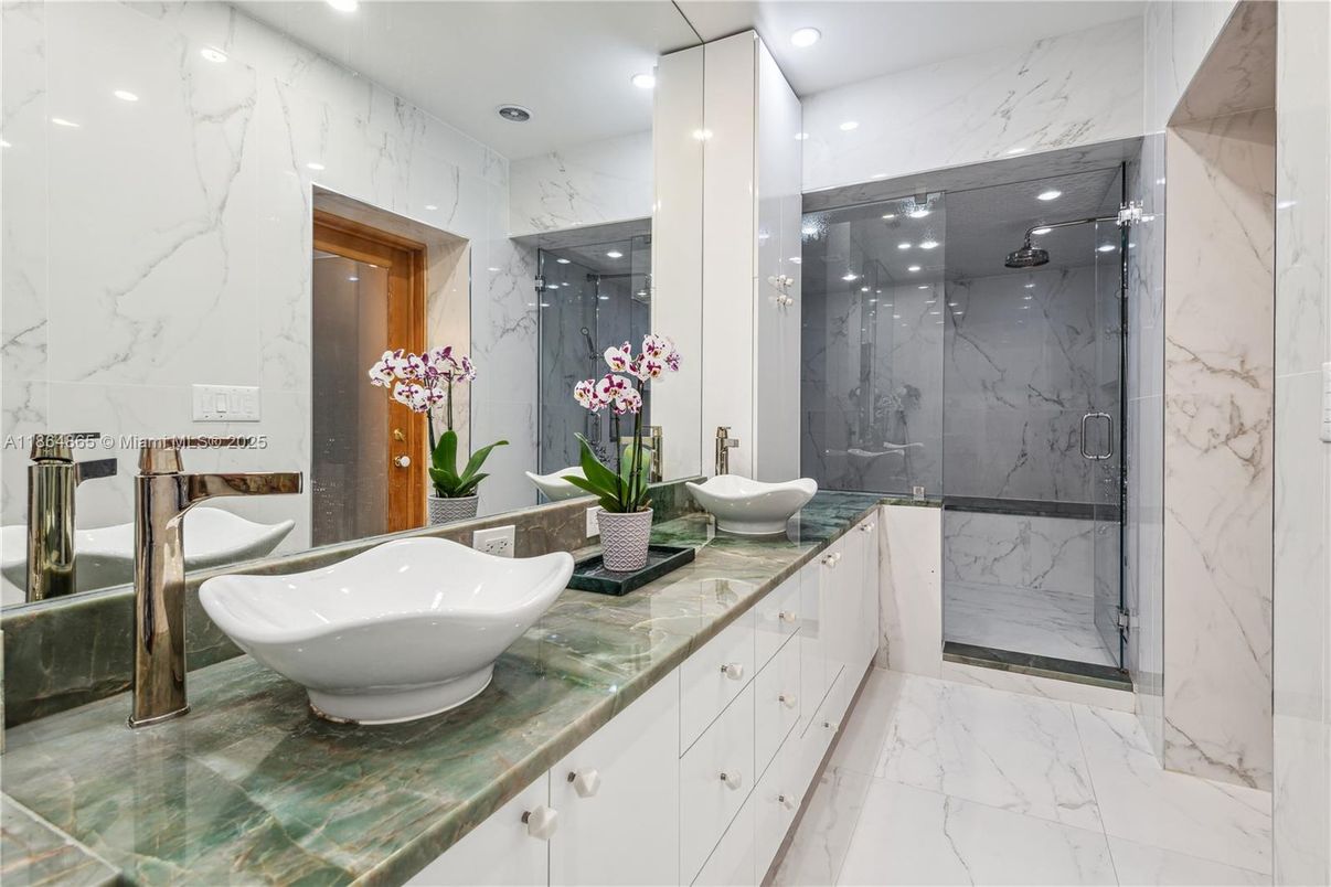 Bathroom, Dual Sink Vanities, Glass Shower, Interior, Marble, Marble Walls, Recessed Lighting