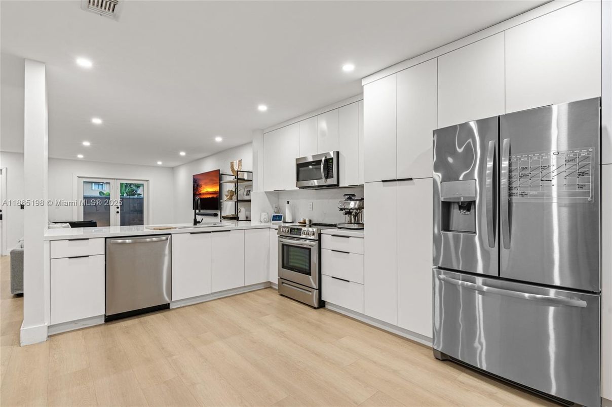 Interior, Kitchen, Recessed Lighting, Stainless Steel Appliances, Wood Texture Flooring