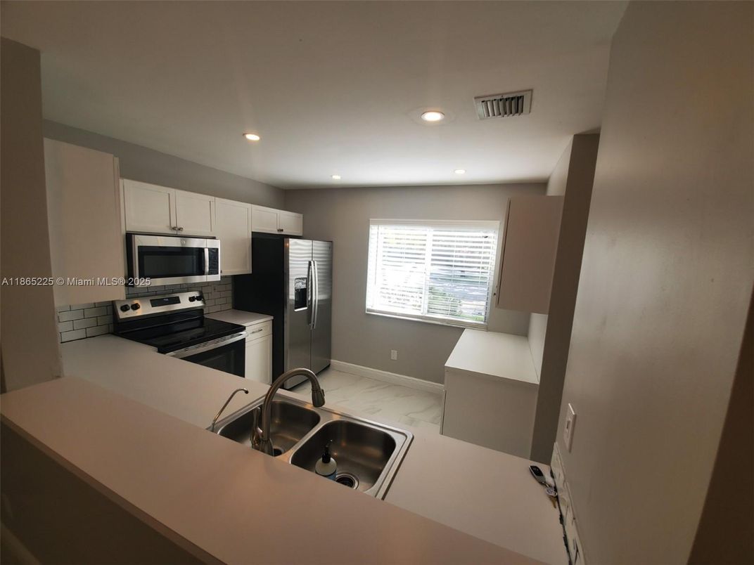 Interior, Kitchen, Marble, Recessed Lighting, Stainless Steel Appliances