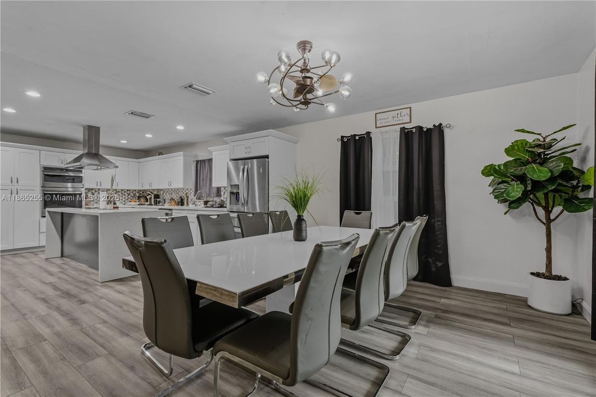 Dining room, Interior, Kitchen, Recessed Lighting, Stainless Steel Appliances, Wood Texture Flooring