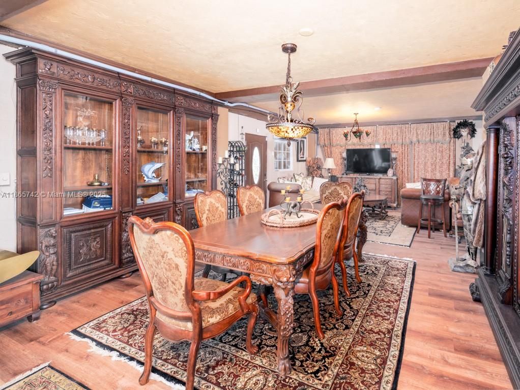 Dining room, Fireplace, Interior, Living room, Pendant Lights, Wood Texture Flooring