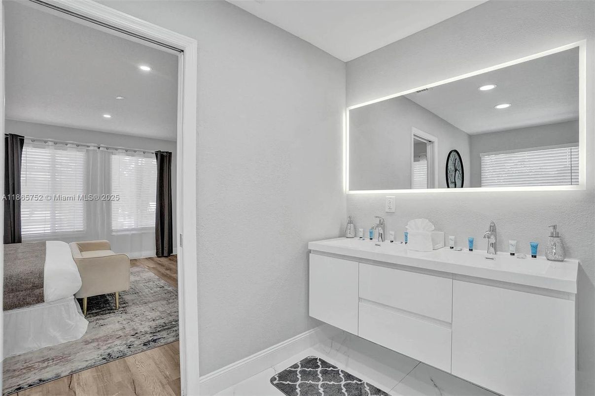 Bathroom, Dual Sink Vanities, Interior, Recessed Lighting, Wood Texture Flooring
