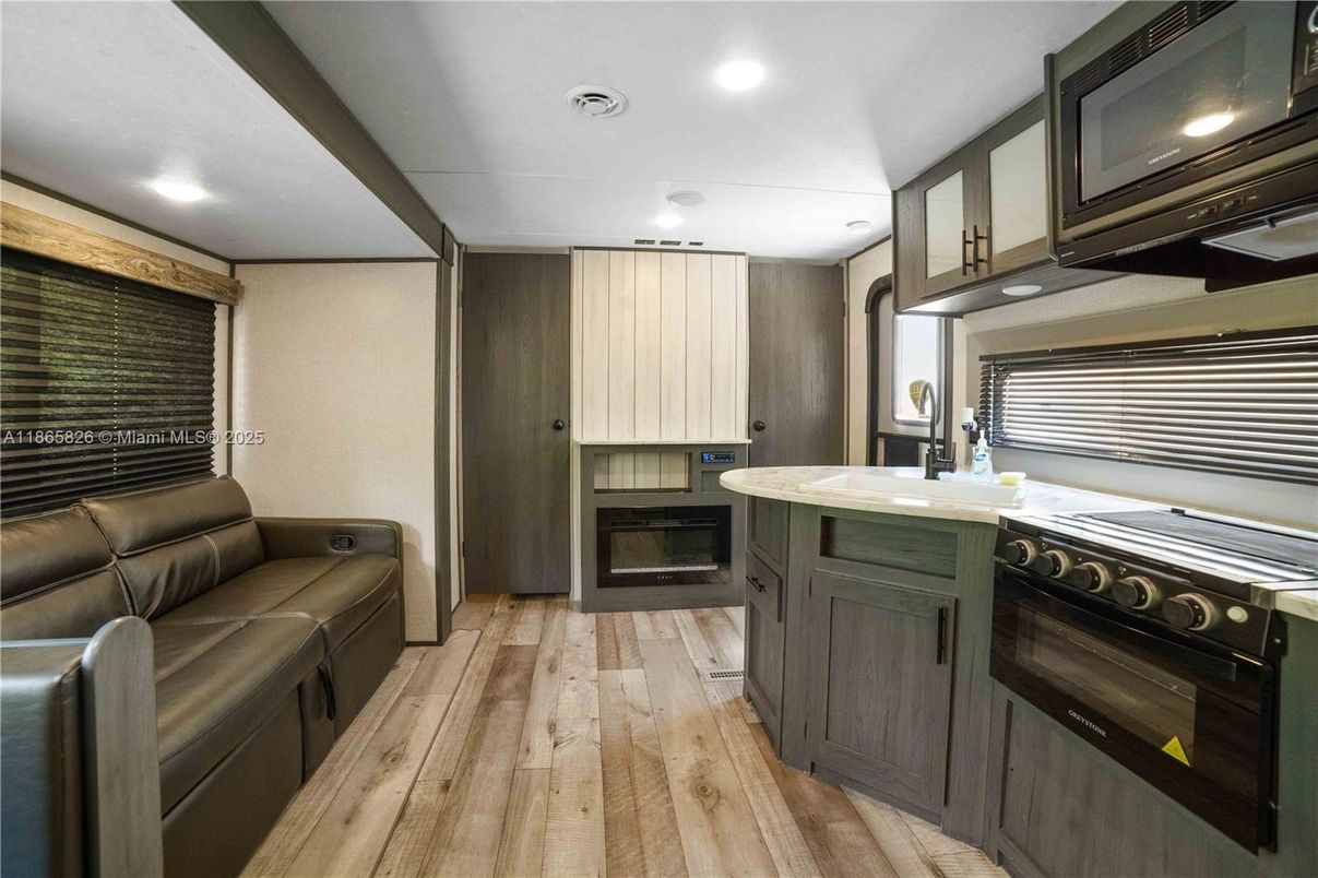 Interior, Kitchen, Recessed Lighting, Stainless Steel Appliances, Wood Texture Flooring