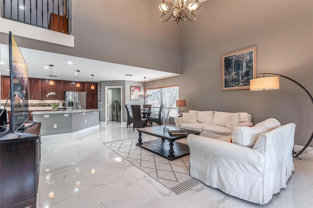 Chandelier, Dining room, Interior, Kitchen, Living room, Marble, Pendant Lights, Recessed Lighting, Stainless Steel Appliances