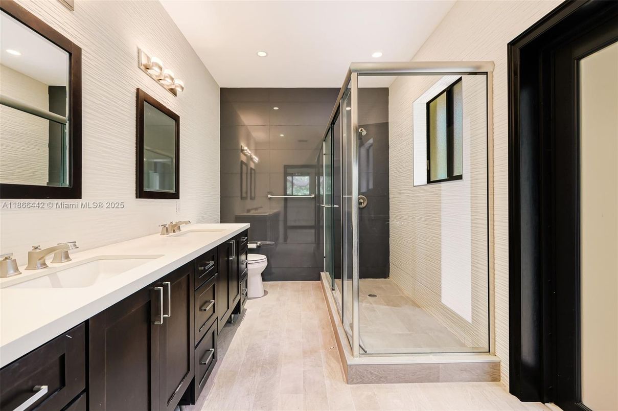 Bathroom, Dual Sink Vanities, Glass Shower, Interior, Recessed Lighting, Wood Texture Flooring