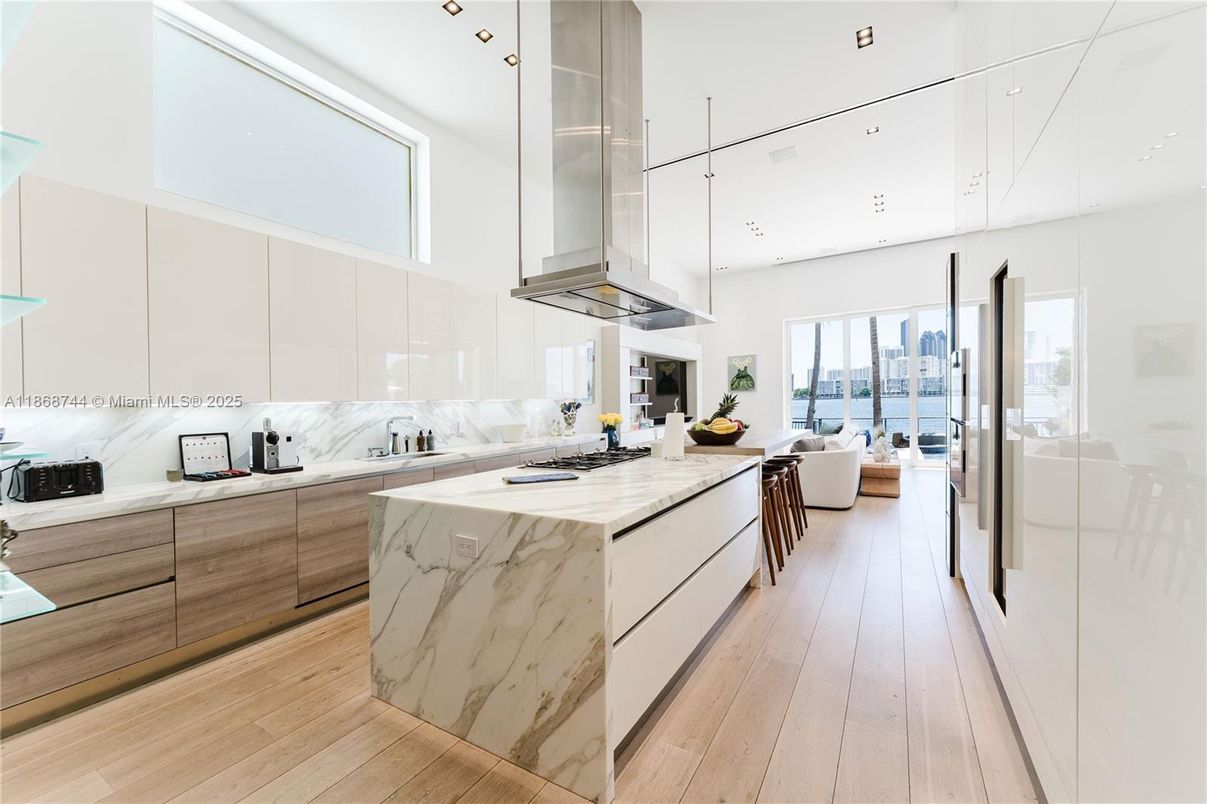 Interior, Kitchen, Marble Walls, Pendant Lights, Recessed Lighting, Water, Wood Texture Flooring