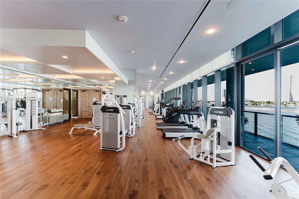 Fitness Equipment, Gym, Interior, Recessed Lighting, Water, Wood Texture Flooring