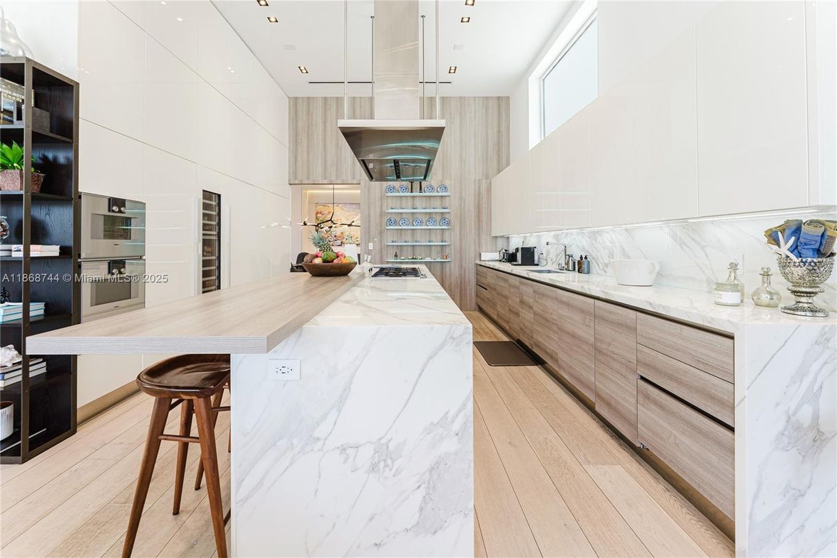 Interior, Kitchen, Marble Walls, Pendant Lights, Recessed Lighting, Wood Texture Flooring