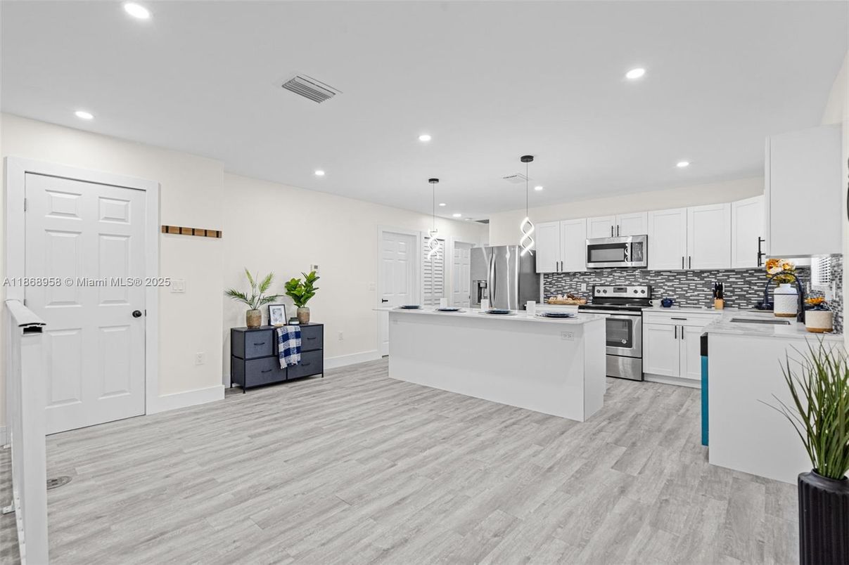 Interior, Kitchen, Pendant Lights, Recessed Lighting, Stainless Steel Appliances, Wood Texture Flooring