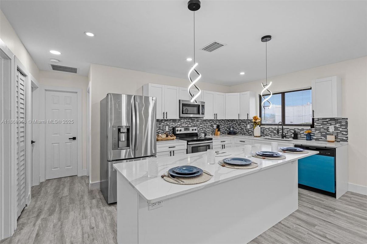 Interior, Kitchen, Pendant Lights, Recessed Lighting, Stainless Steel Appliances, Wood Texture Flooring