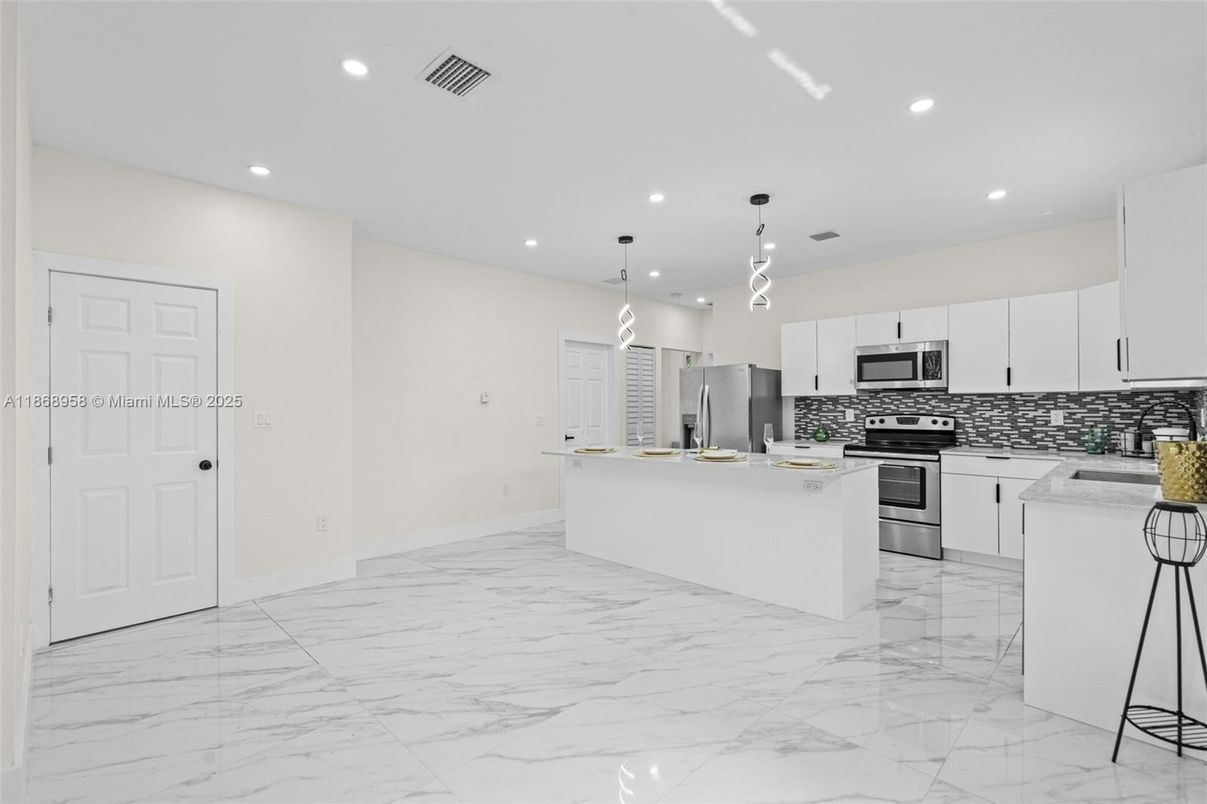 Interior, Kitchen, Marble, Pendant Lights, Recessed Lighting, Stainless Steel Appliances