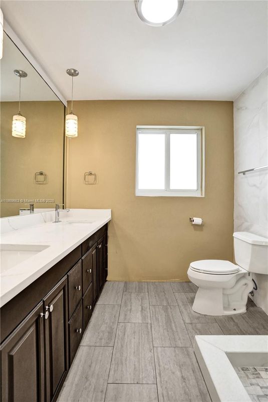Bathroom, Dual Sink Vanities, Interior, Marble Walls, Pendant Lights