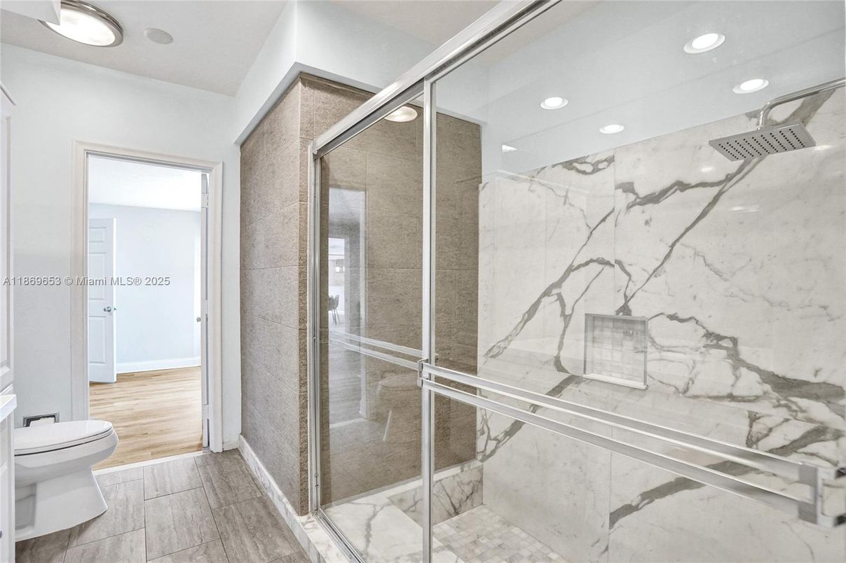 Bathroom, Glass Shower, Interior, Marble Walls, Recessed Lighting, Wood Texture Flooring