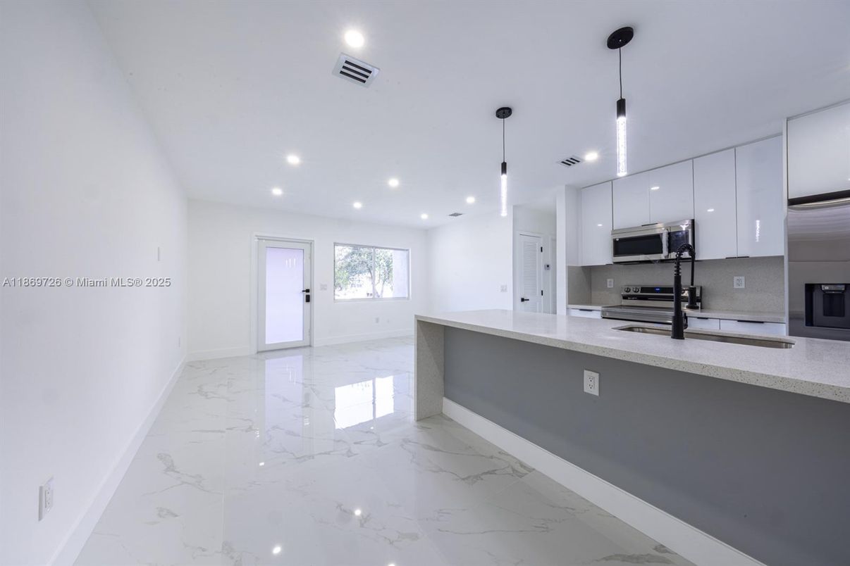 Interior, Kitchen, Marble, Pendant Lights, Recessed Lighting, Stainless Steel Appliances