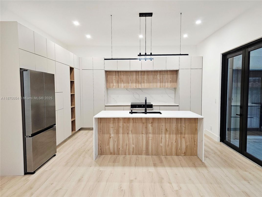 Interior, Kitchen, Pendant Lights, Recessed Lighting, Stainless Steel Appliances, Wood Texture Flooring
