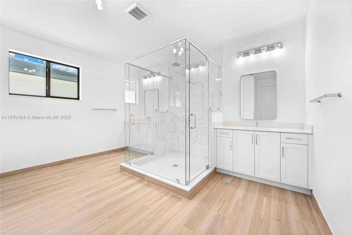 Bathroom, Glass Shower, Interior, Marble Walls, Wood Texture Flooring