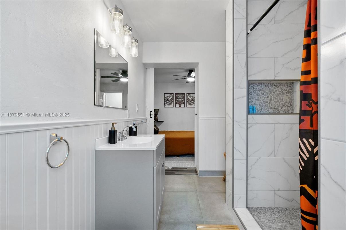 Bathroom, Dual Sink Vanities, Glass Shower, Interior, Marble Walls