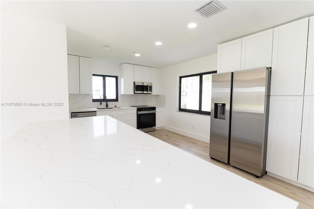 Interior, Kitchen, Recessed Lighting, Stainless Steel Appliances, Wood Texture Flooring