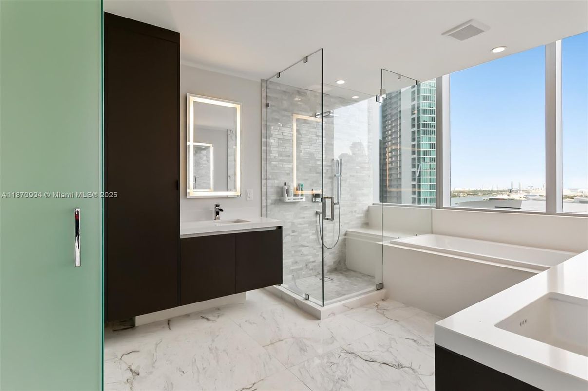 Bathroom, Dual Sink Vanities, Glass Shower, Interior, Marble, Recessed Lighting, Water