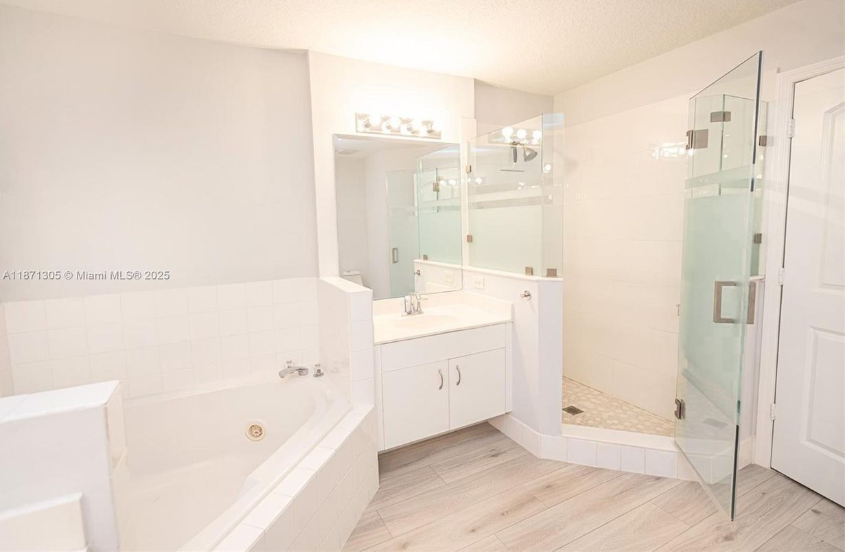 Bathroom, Dual Sink Vanities, Glass Shower, Interior, Wood Texture Flooring